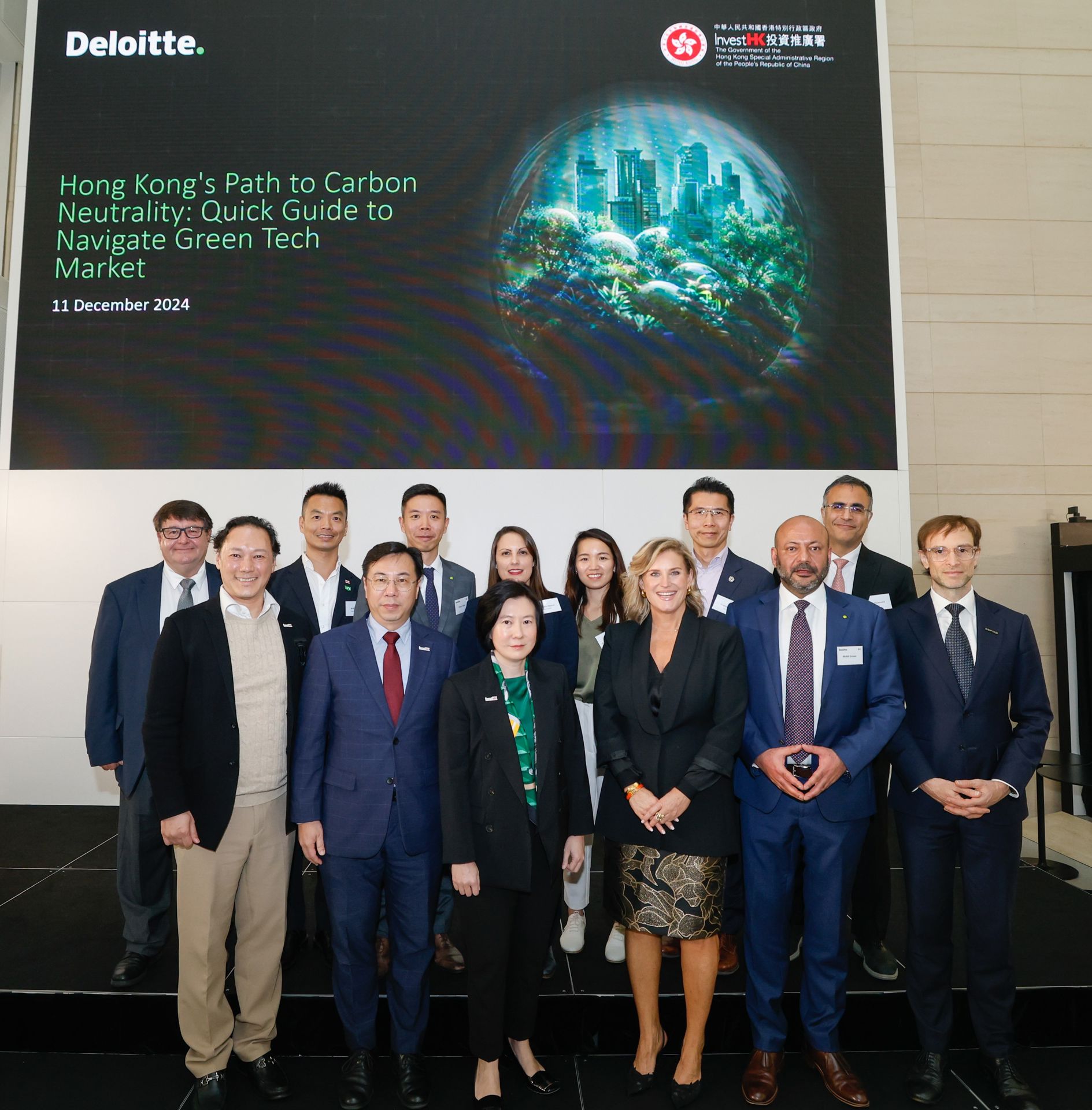 Director-General of Investment Promotion at InvestHK, Ms Alpha Lau (front row, third left); Associate Director-General of Investment Promotion at InvestHK Mr Arnold Lau (front row, second left); the Global Head of Financial Services, FinTech & Sustainability at InvestHK, Mr King Leung (front row, first left); Deloitte Global GreenSpace Tech Leader Ms Andrea Culligan (front row, third right); Deloitte China Hong Kong Sustainability & Climate Leader Mr Mohit Grover (front row, second right); and other speakers at the launch event